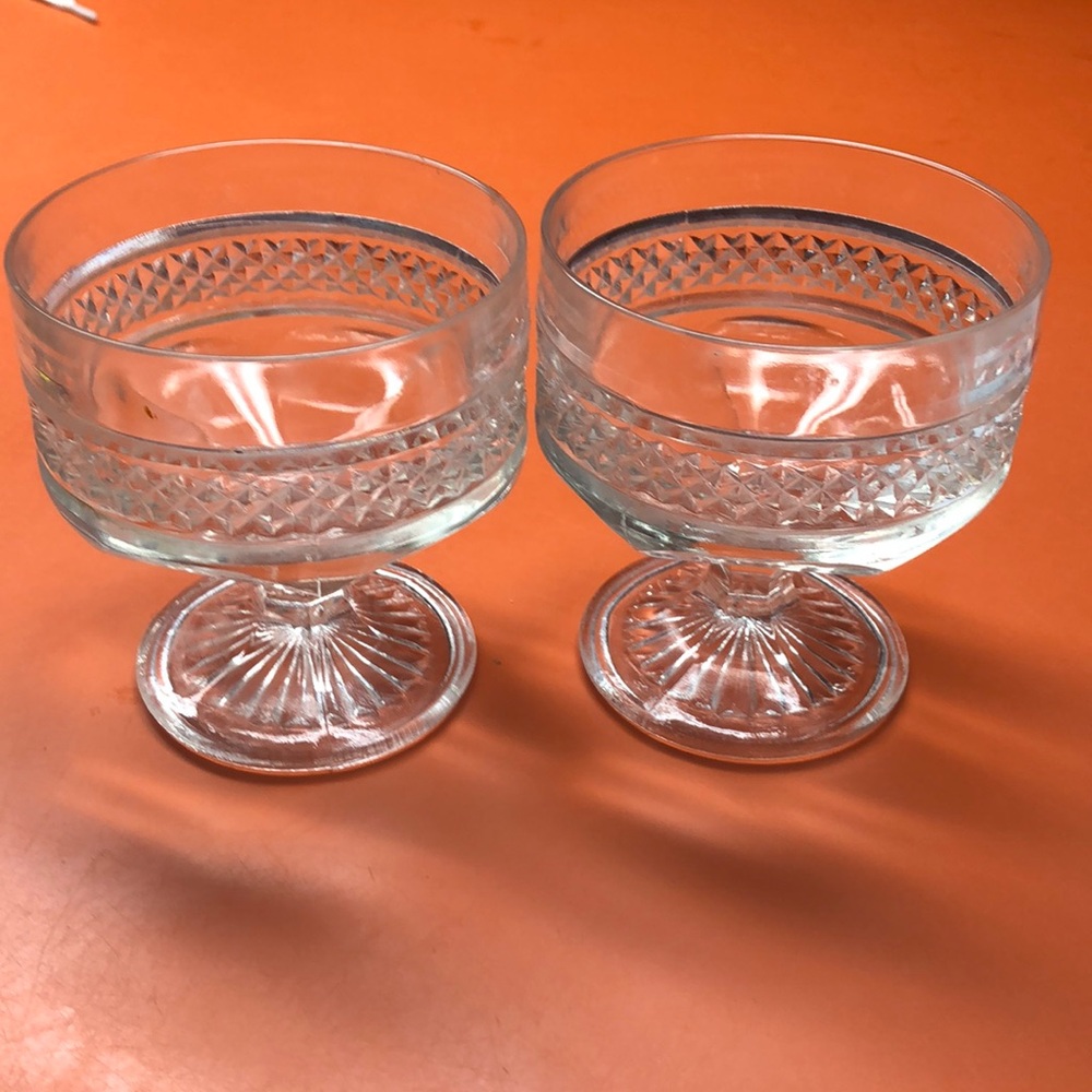 Lot of two vintage Kosta Boda Clayton footed glasses